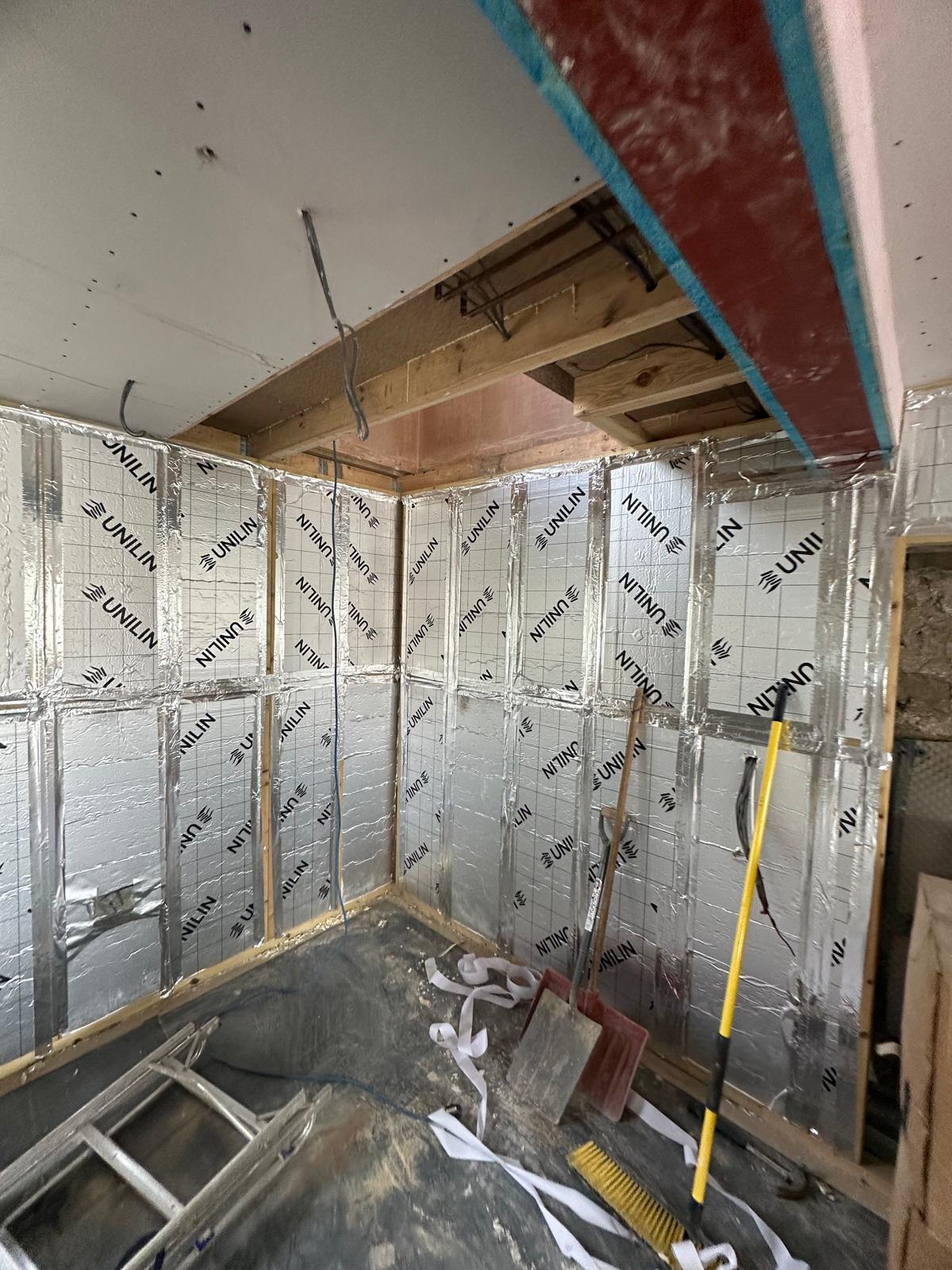 Acoustic insulation installed within a partition wall